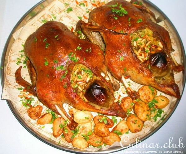 Уточки в духовке начинёные рисом и фаршем