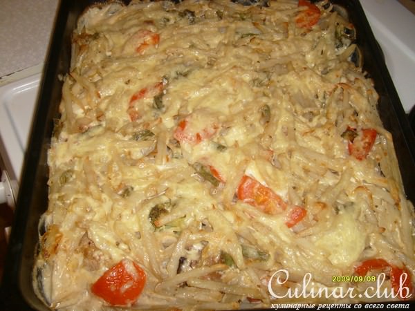 Курица запеченная под овощами.