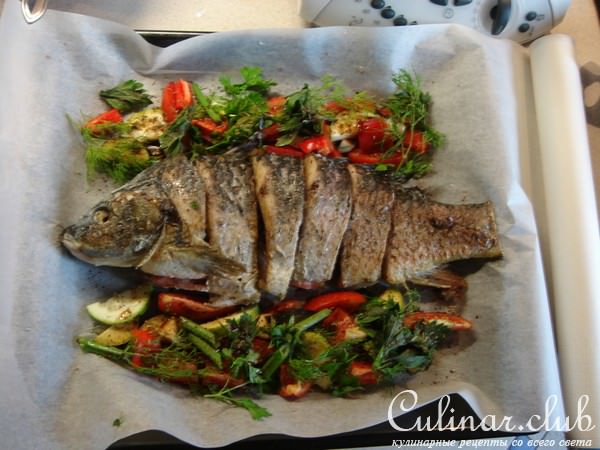 Запеченная рыба с овощами.