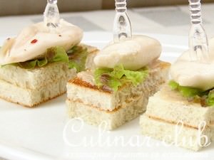Канапе с фаршированным кальмаром и анчоусным маслом