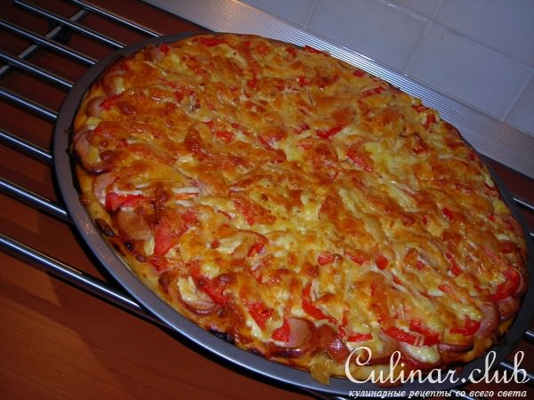 Пицца (сыр,помидоры,сосиски )